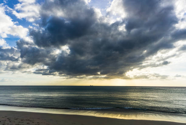 istock Clouds Typologies: Dramatic Sky, Stratus, Cumulus, and Stratocumulus clouds at Sunset on tropical beach, Ko Lanta, Krabi, Thailand. 686639894