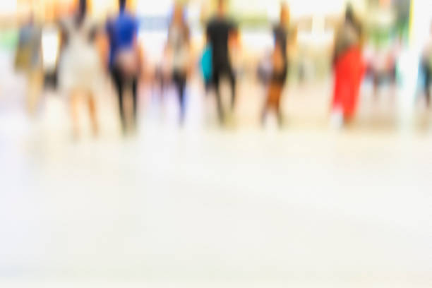 istock city people crowd abstract background blur action 686642198