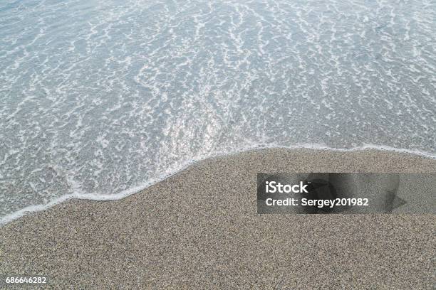 Transparent Sea And Beach Pebbles Background Stock Photo - Download Image Now - Beach, Clean, Foam - Material