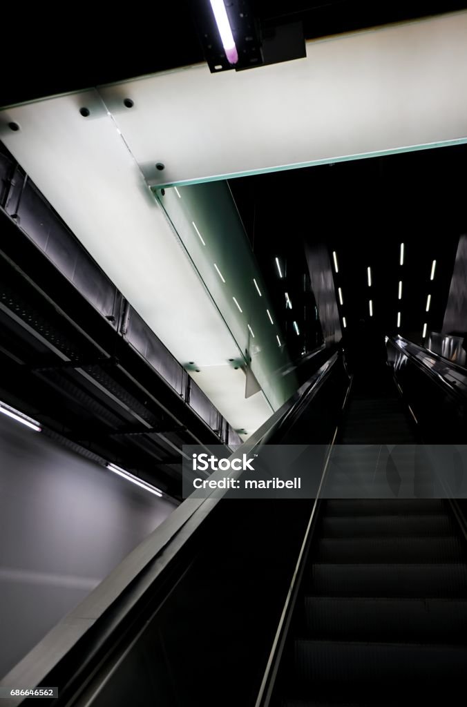 escalator escalator in atmospheric light Indoors Stock Photo