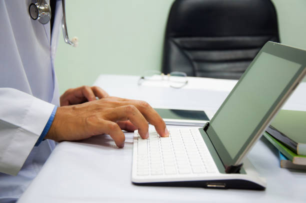 istock Businessman working at office. Digital tablet laptop computer smart phone 686657078
