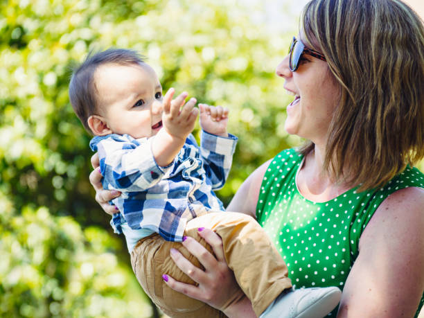istock Real mother with little son in park 686674872