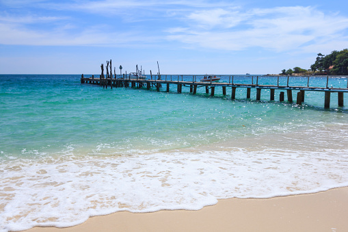 Summer tropical sea, beach, wave and blue sky at Koh Samed Island, famous tourist attraction in Rayong province, Thailand.