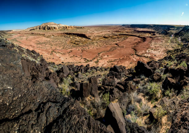 istock A Beautiful Wild Western Canyon Surrounded with Lava Rock Cliffs in New Mexico 686699188