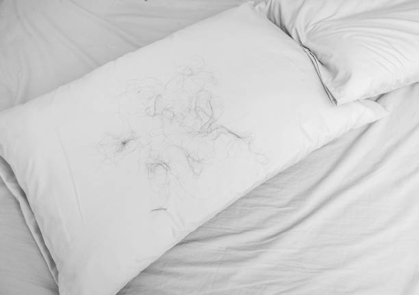 Hair loss with Pillow on the bed, background Hair loss with Pillow on the bed, background hair on pillow stock pictures, royalty-free photos & images