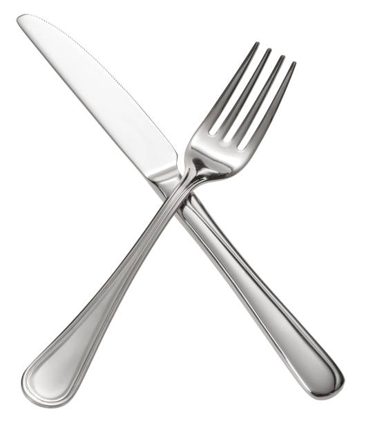 istock Fork and knife crossed. Isolated on a white background. 686717386