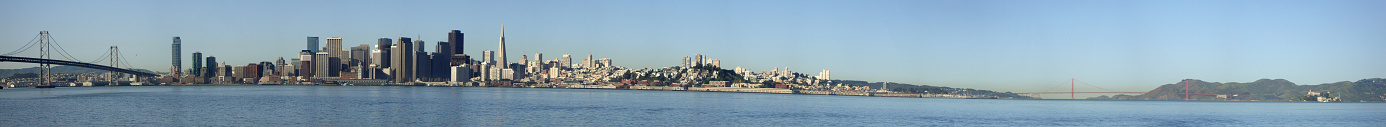 San Francisco Skyline during the day, taken from treasure island featuring many San Francisco monuments