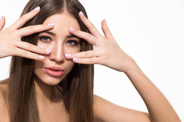 istock Woman with fingers near eyes 686721484