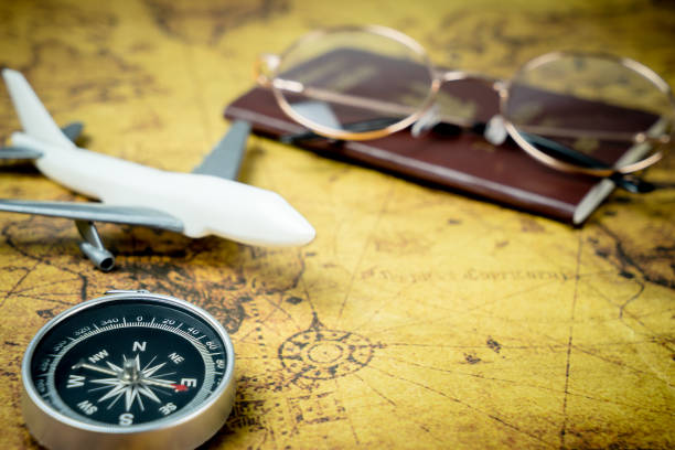 istock Vintage Explorer travel accessories on vintage map 686723882