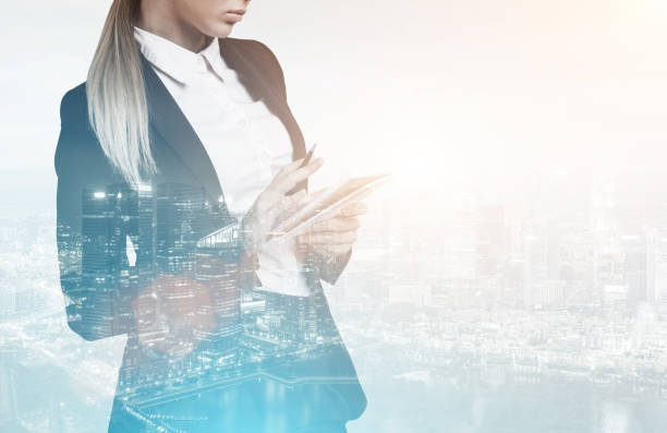 istock Woman with notebook in blue city 686727314