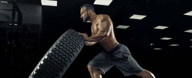 istock Adult guy bodybuilder posing in gym 686727952
