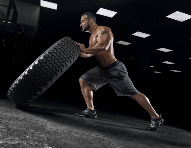 istock Adult guy bodybuilder posing in gym 686727984
