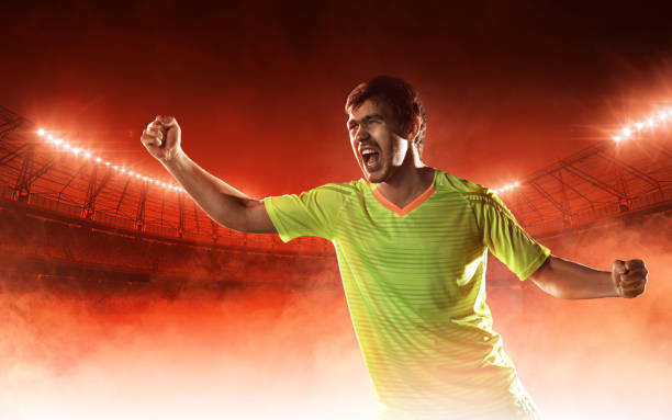 istock soccer player celebrating a goal 686739932