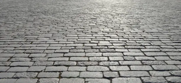 Photo of Abstract background of old cobblestone pavement