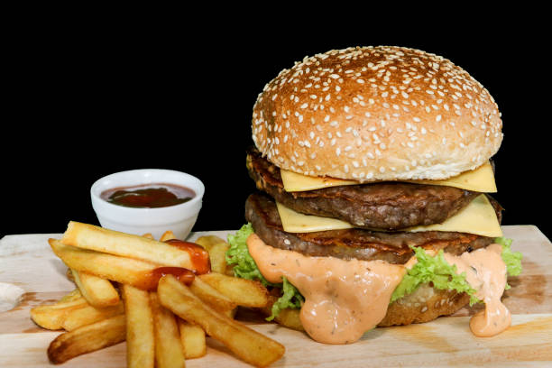 istock Double hamburger  fries and ketchup 686742964