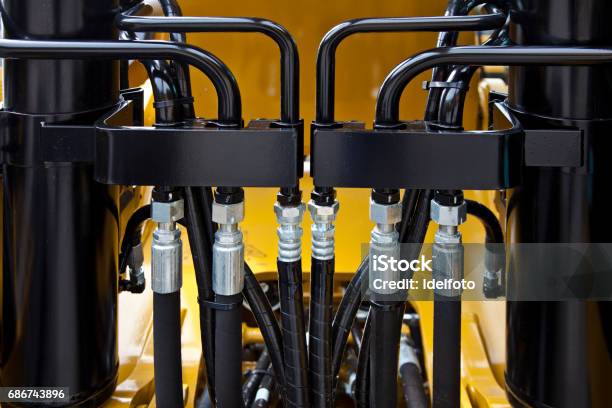 Hydraulic Pipes Stock Photo - Download Image Now - Backhoe, Spare Part, Machine Part