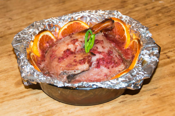 istock Two duck legs baked in foil 686744174