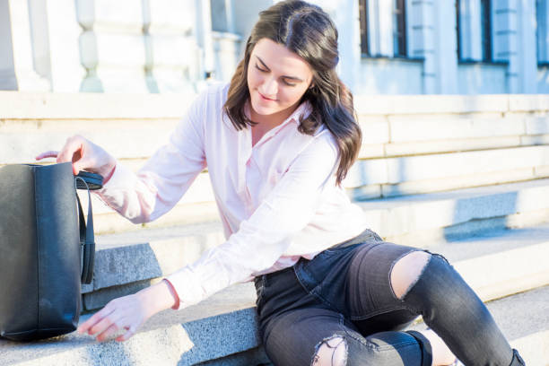 istock Young woman on stairs 686747302