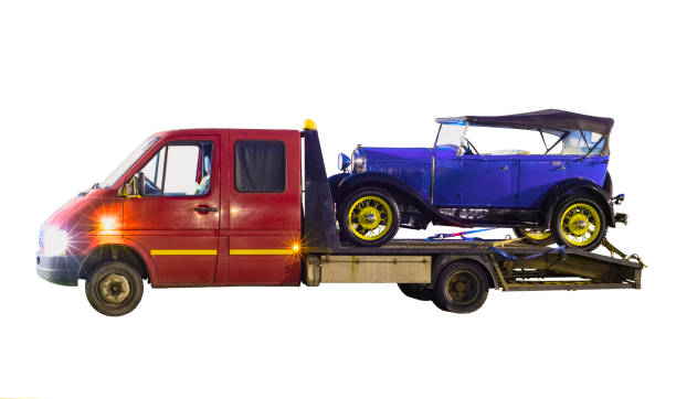 istock Tow truck and car in the back 686755976