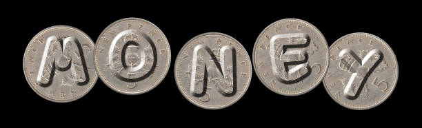 istock MONEY – Coins on black background 686756120