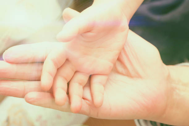 istock Mother's and baby's hands. Family concept 686765718
