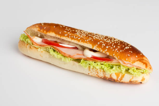 istock Baguette sandwich with lettuce, tomato and smoked ham 686771294