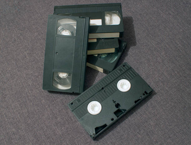 istock Five old vidio cassettes lie together gray background 686783462