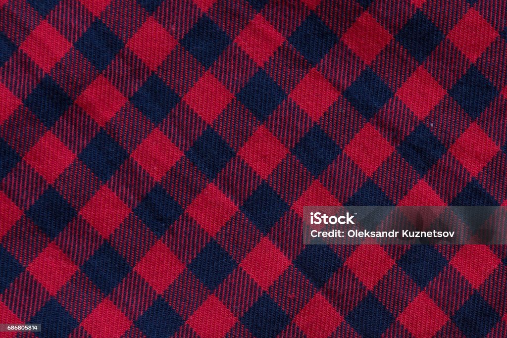 Checkered cloth texture with red and blue stripes Checkered cloth texture with red and blue stripes, close-up Plaid stock illustration