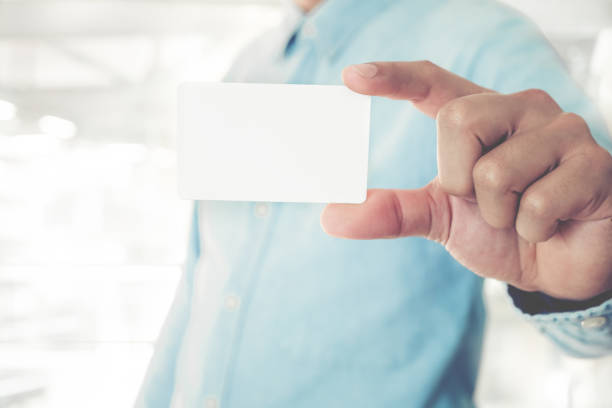 istock Businessman with business card 686812394
