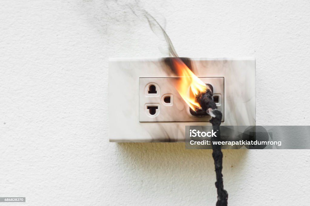 Electricity short circuit Electricity short circuit / Electrical failure resulting in electricity wire burnt Electricity Stock Photo