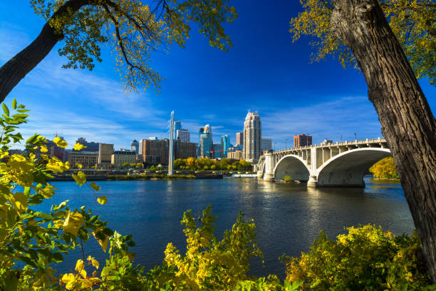 istock View of Minneapolis, surrounded by autumn colored trees 686837496