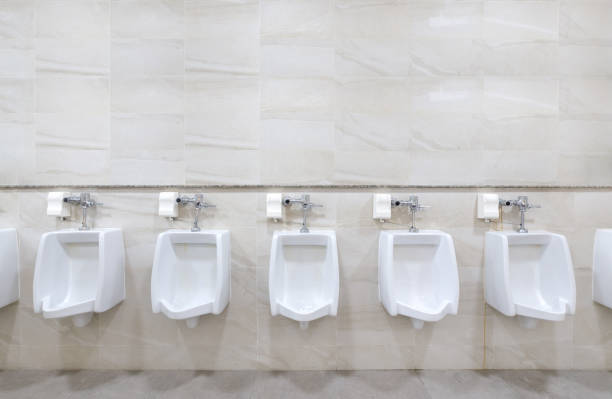 men restroom inside a shopping mall. - urinal clean contemporary in a row imagens e fotografias de stock