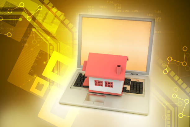 istock House model on the laptop 686870364
