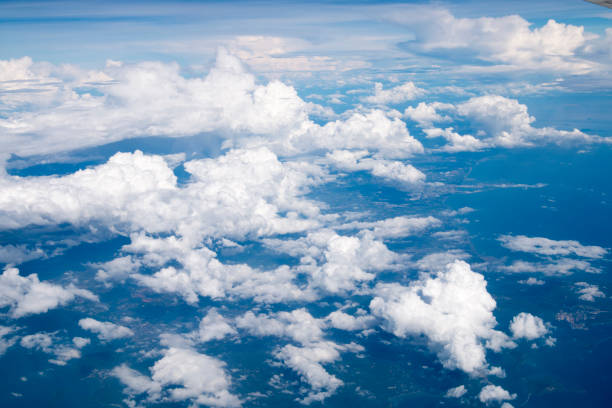 istock Top view Clouds and sky as seen through window of an aircraft 686873184