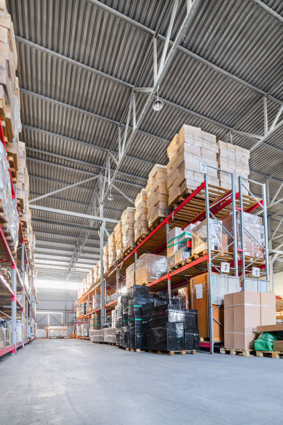 istock Long shelves with a variety of boxes and containers 686873534