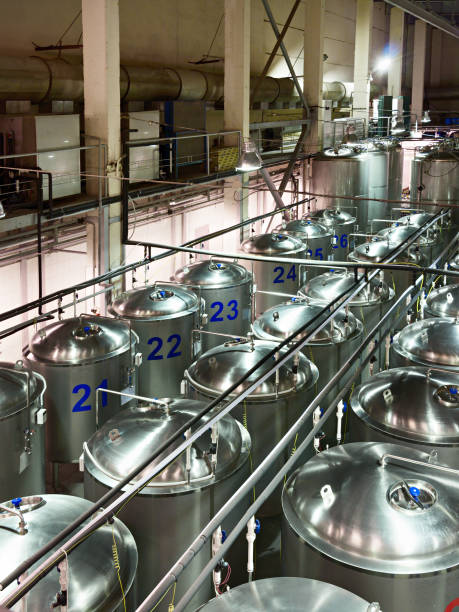 istock Tanks from food stainless steel, lined up in long rows 686876268