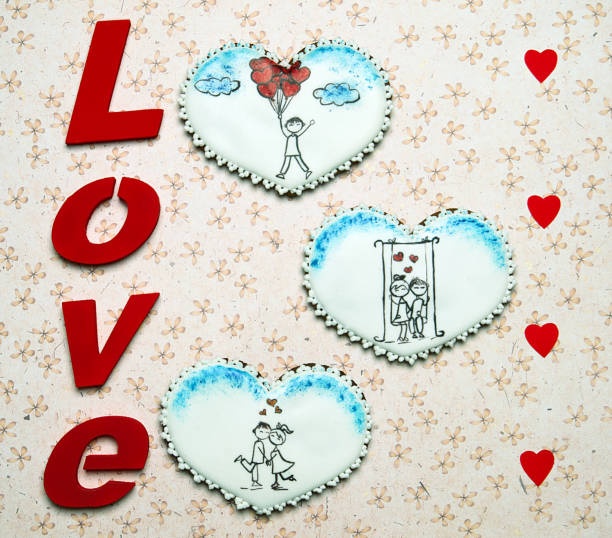 istock Gingerbread hearts with love scenes. 686876272