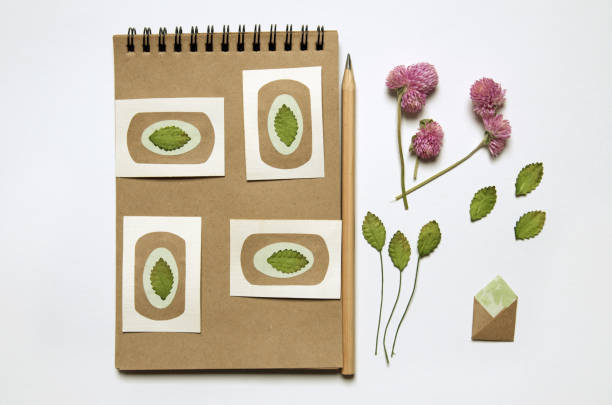 istock Craft paper sketch-book with flowers 686876282