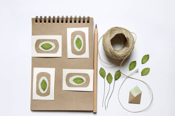 istock Craft paper sketch-book with flowers 686879620