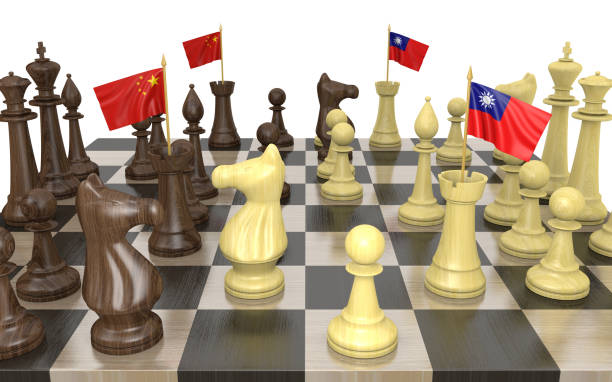 China and Taiwan foreign policy strategy and power struggle, 3D rendering 3D rendered chess game conceptualizing the political fighting and power struggle between China and Taiwan. taiwanese flag stock pictures, royalty-free photos & images
