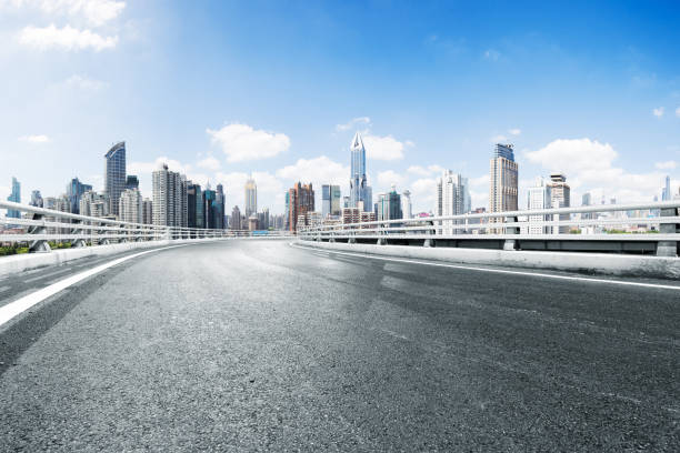 istock empty road in midtown of modern city 686886020