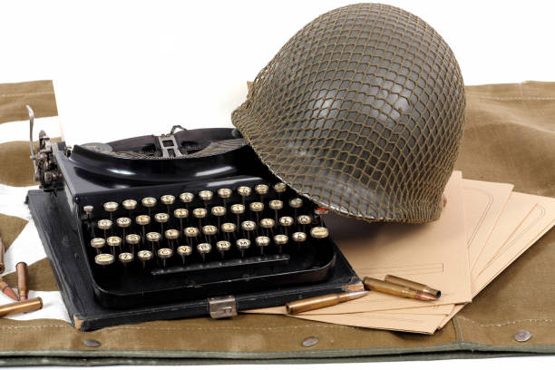 istock US military helmet of the Second World War with old typewriter 686887100