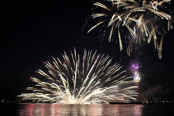 It is fireworks display of Miyajima in Hiroshima prefecture of Japan.
