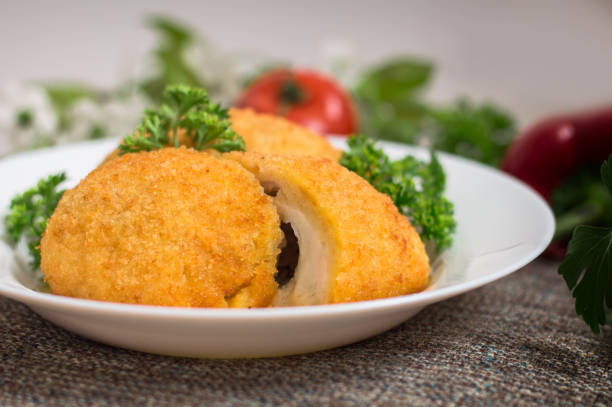 istock Chicken cutlets on Kiev. Old background. Top view. Close-up 686911154
