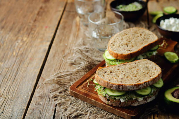 istock Ricotta sprouts avocado cucumber rye sandwich 686911632