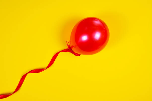 istock Red balloon on a red ribbon 686911684