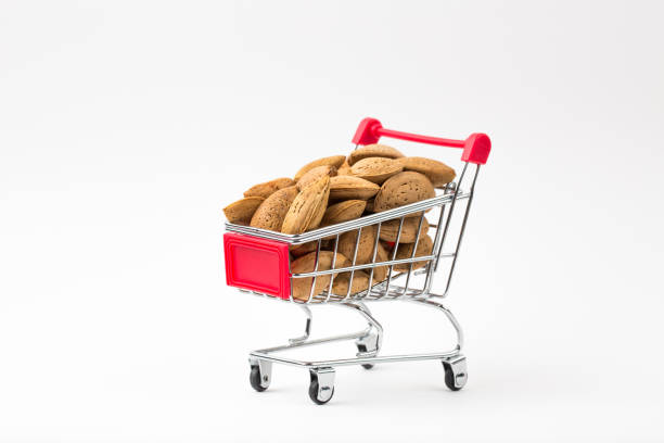 istock Isolated Almonds in Shopping Cart 686916960