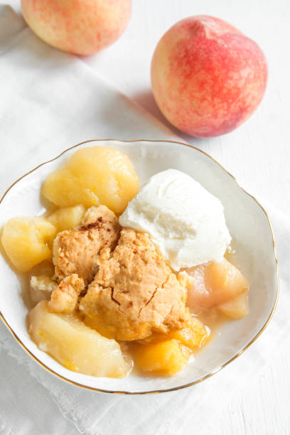 istock peach cobbler with vanilla ice cream 686917206