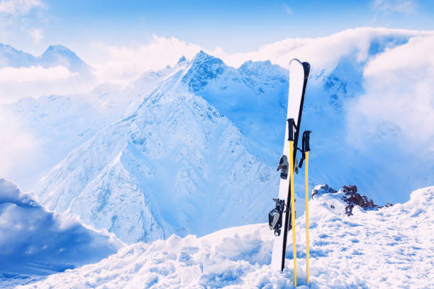 istock Winter mountains and ski equipment in the snow 686917266