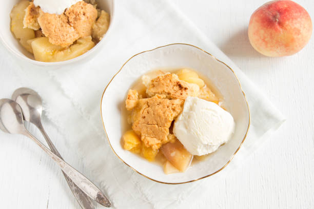 istock peach cobbler with vanilla ice cream 686917648